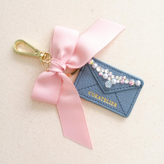 Curatelier Hannah Blue Leather Envelope Keychain Bag Charm (Blessed)