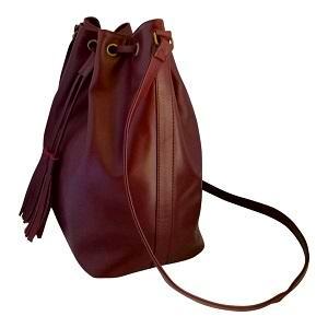 Velle Dahlia Medium Bucket Bag With Tassel Drawstring in Maroon Cow Leather (Side View)