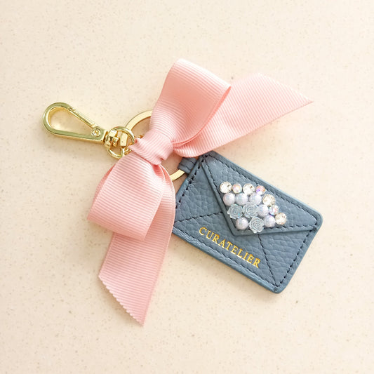 Curatelier Naomi Blue Leather Envelope Keychain Bag Charm (Blessed)