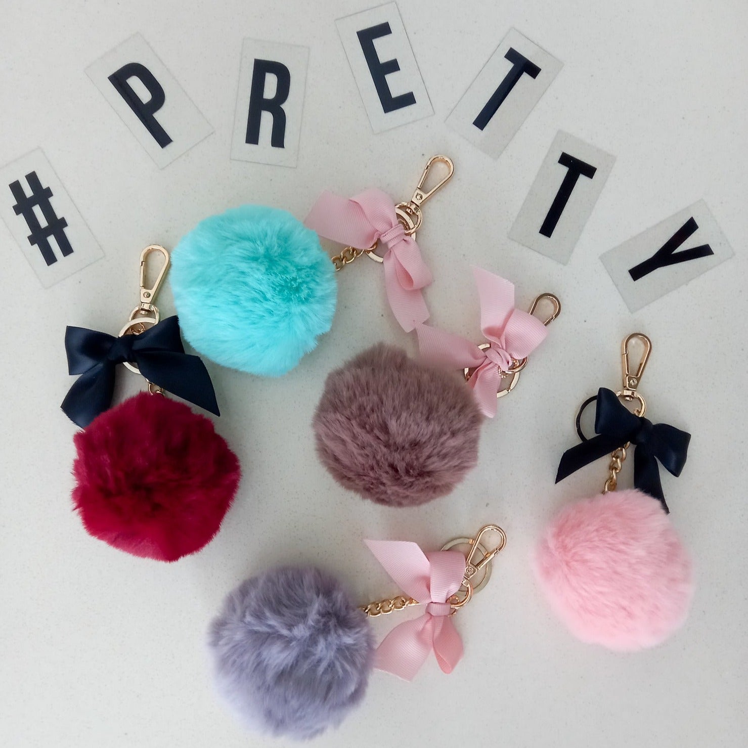 Puffed Up Logo Key Ring: Women's Designer Bag Charms & Key Rings